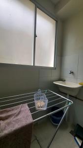 Apê confortável no Cond. Jardim dos Coqueiros