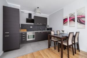 Białoruska Apartment with Balcony and Parking Place in Cracow by Renters