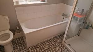 Beachside Family Home Sleeps 8 with Parking