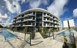 Resort em Porto de Galinhas- Flat Térreo Frente Piscinas- Muro Alto-B18