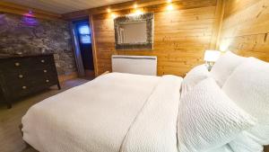 Appartements Le Grenier 1821 - Mini chalet - Centre village - AravisTour : photos des chambres