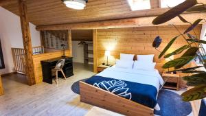 Appartements Le Grenier 1821 - Mini chalet - Centre village - AravisTour : photos des chambres