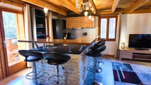 Appartements Le Grenier 1821 - Mini chalet - Centre village - AravisTour : photos des chambres