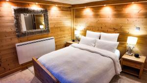 Appartements Le Grenier 1821 - Mini chalet - Centre village - AravisTour : photos des chambres