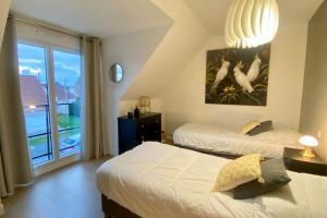 Maisons de vacances Superb cottage for 4 people with views of the dunes : photos des chambres