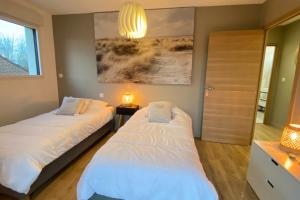 Maisons de vacances Cosy cottage for 4 people with access to the dunes : photos des chambres