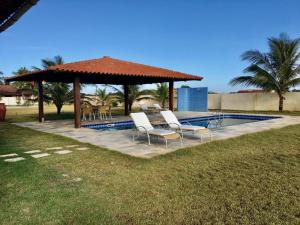 Mansão cinematográfica pé na areia