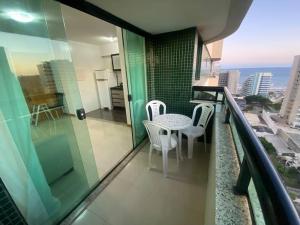 Quarto, sala, cozinha e garagem com praia 400 metros