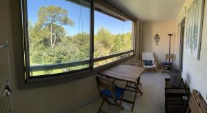 Résidence Olivier - APPARTEMENT FRONT DE MER DANS DOMAINE AVEC PISCINE MAE-8764