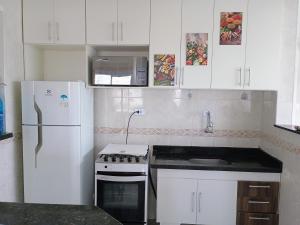 Apartamento Praia Grande 30 metros da praia Estacionamento Gratuito e WI-FI