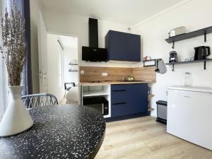 Appartements Le Lumineux - Coeur de Ville : photos des chambres