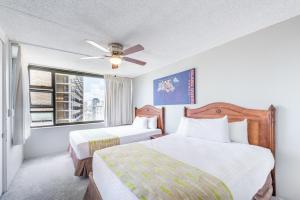 Waikiki Banyan High Level Condo with Private Lanai condo
