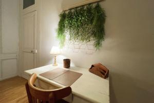 Appartements L'impromptu - Hyper center : photos des chambres