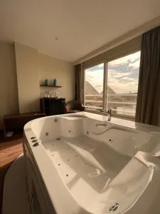 The Home Boutique Hotel Pyramids Inn - Nazlat as Sammān