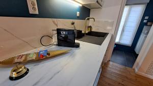 Les Appartements du 104 : Studio avec mezzanine