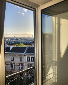 Rooms with fabulous view on Paris roofs
