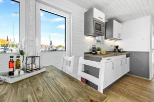 Hausboot Glücksmomente mit Dachterrasse in Schleswig am Ostseefjord Schlei