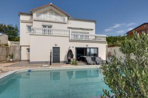 Villa with a beautiful panoramic view and a swimming pool- by Traveler tourist agency Krk ID 2397