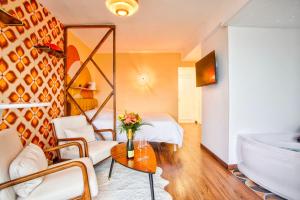 Suite année 70 - Jacuzzi et Balcon