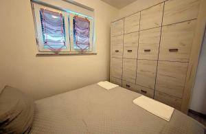 Apartments by the sea Barbat, Rab - 22251