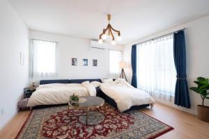 エメラルド色に輝く希望ヶ丘ビーチまで徒歩圏内！リゾート地恩納村のお洒落な3LDK一軒家貸し切り！