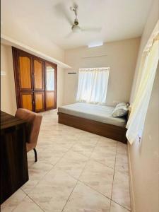 Home at Guruvayur 2 AC Room,1 single bed,Kitchen