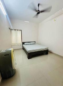 Home at Guruvayur 2 AC Room,1 single bed,Kitchen
