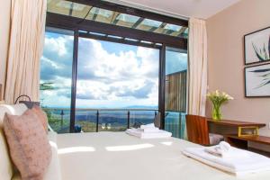 Glass House at Champagne Ridge Villa by YourHost