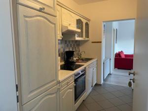 Two-Bedroom Apartment with Sofa Bed room in Strandhaus am Kurpark