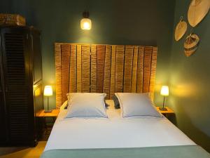 Appartements Un jardin en ville - Parking gratuit : photos des chambres