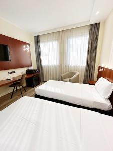 Twin Room room in iH Hotels Milano Blu Visconti