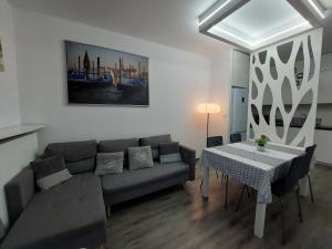 Apartament JK 47 A z miejscem postojowym w garażu