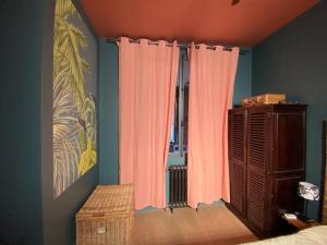 Appartements Un jardin en ville - Parking : photos des chambres