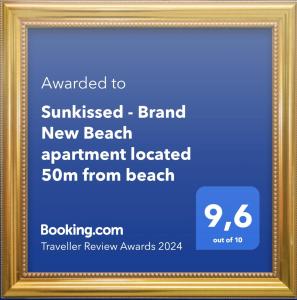 Sunkissed - Brand New Beach apartment located 50m from beach