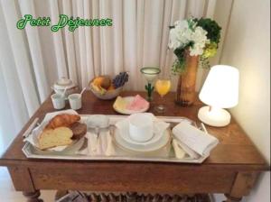 B&B / Chambres d'hotes LE FORTUNY - 3 Suites, 2 apparts, 1 chambre - proche TRAM ligne aeroport et parking gratuit : photos des chambres