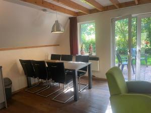Het Familie Boshuisje - vakantiewoning op prachtig park met veel faciliteiten inc ligbad