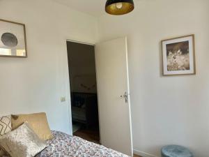 Maisons de vacances Cosy Maisonette Versailles : photos des chambres