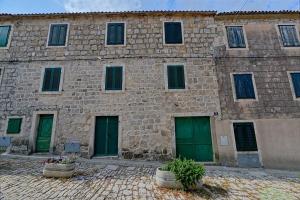 Apartments by the sea Postira, Brac - 22198