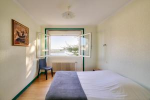 Maisons de vacances Charmante escapade avec vue sur le port : photos des chambres
