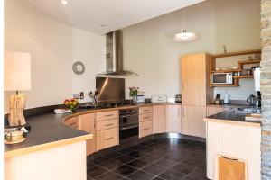 Stylish and spacious home with sea & mountain views