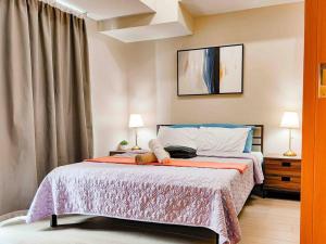 Cozy 1BR with Balcony and Netflix in Uptown BGC