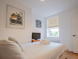 Exquisite Renovation in Central Location with Garden and Parking