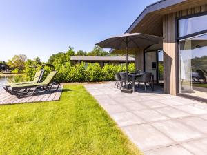 Chalet by Pond with Sauna