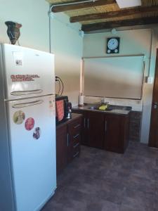 Hermosa casita con quincho y amplia pileta TODAS LAS COMODIDADES Paz total