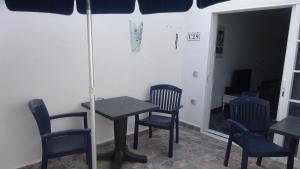 Ferienwohnung mit Dachterrasse, mehreren Pools, Garten und viel Ruhe