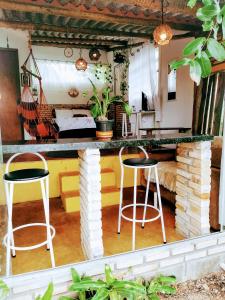 Chalé aconchegante, pertinho da cidade e conectada a natureza