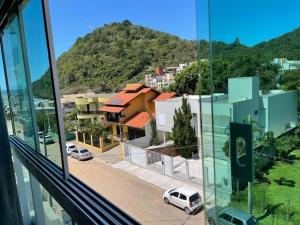 Cantinho acolhedor a poucos passos da Praia Brava