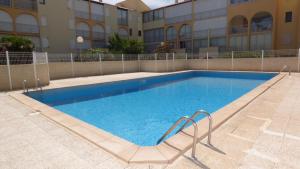 T2, rez-de-jardin, terrasse, piscine, Les Maisons de la Plage, Narbonne Plage