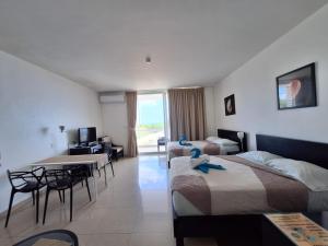 Playa Blanca Towncenter Suite - NO incluye comidas