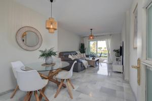 La Cala gorgeous 2 bedroom apartment with stunning gardens, pools and sea views